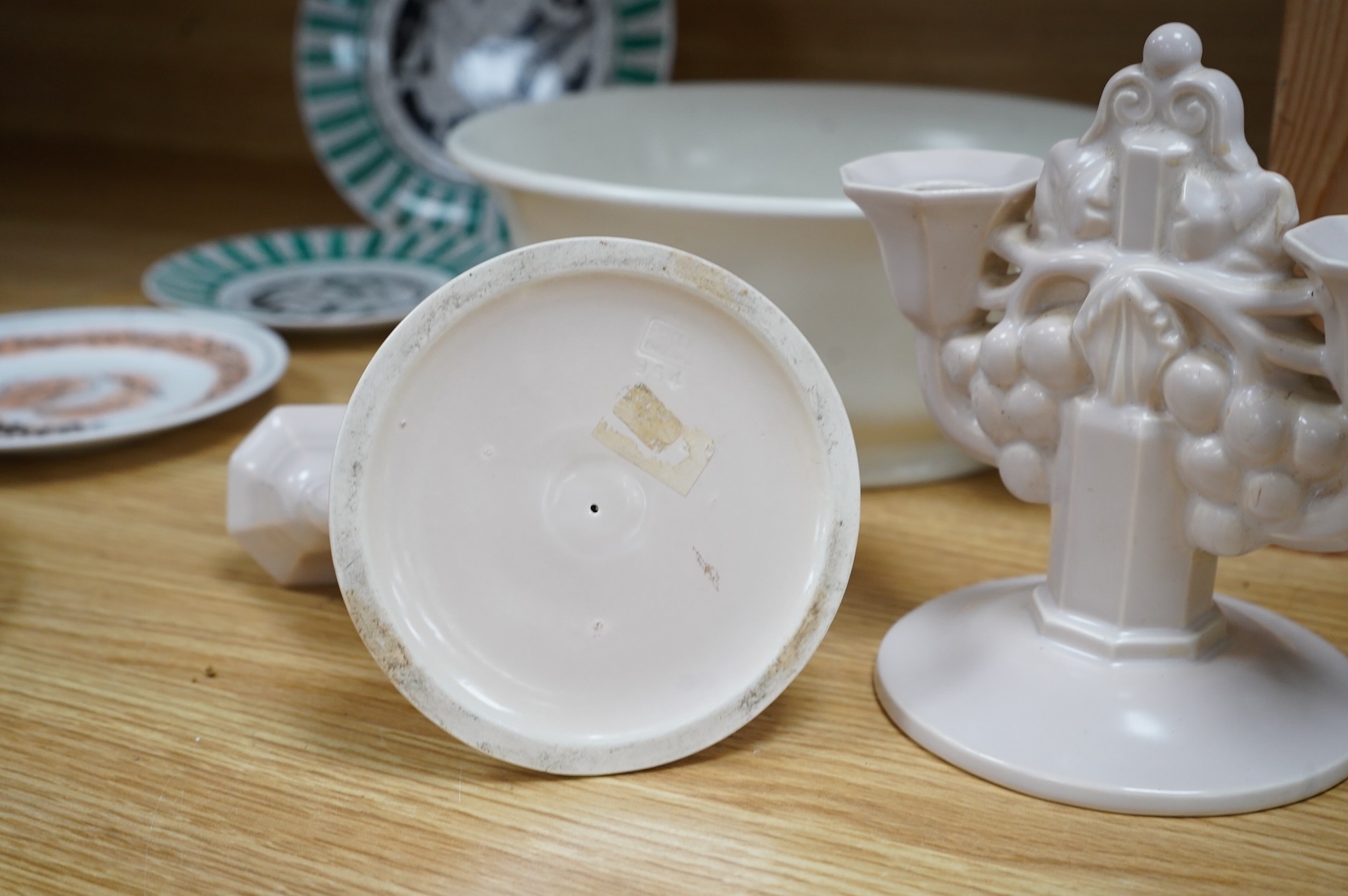 John Adam for Poole pottery, a pair of two branch candelabra and a magnolia white glazed bowl number 672, largest 29cm wide